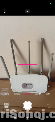 একটি Pta-link রাউটার ও একটি সেটআপ বক্স।